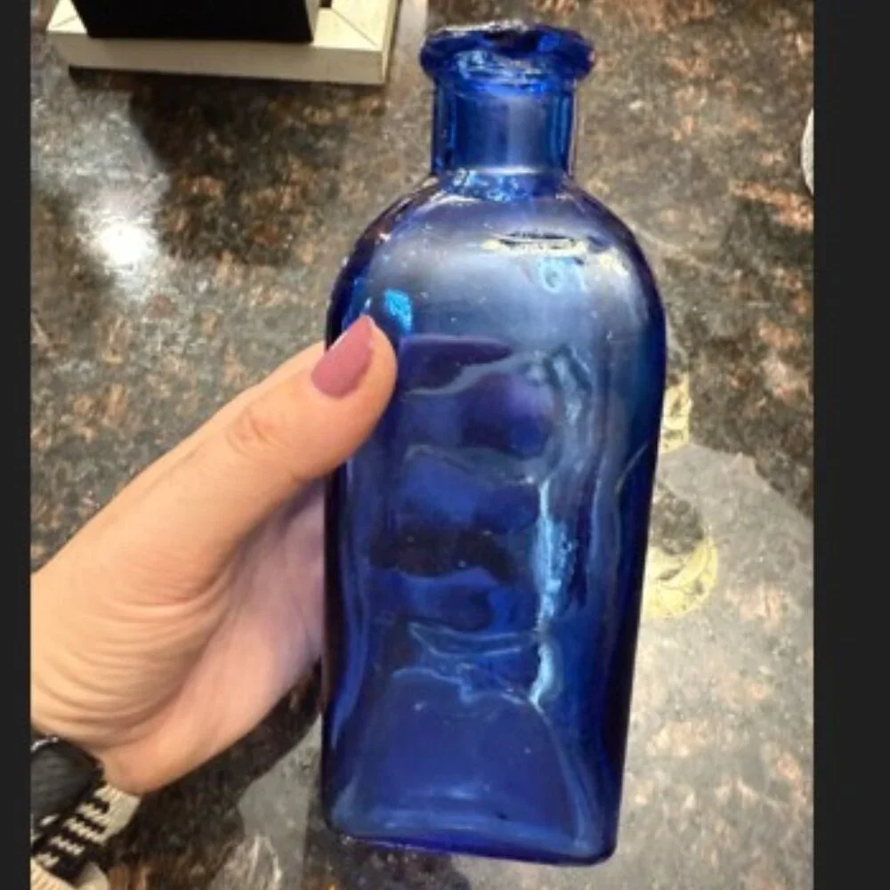 Blue glass decor/vase/pitcher - very pretty!